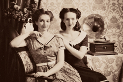 две девушки в гражданских платьях в стиле 40-х